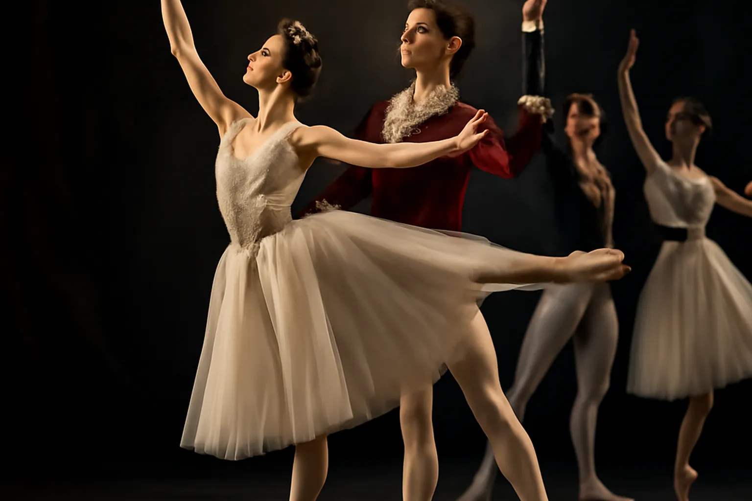 Danseurs de ballet classique en pleine variation sur scène, éclairage théâtral